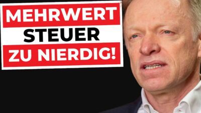 Mehr über den Artikel erfahren SIE DREHEN DURCH: 19% MwSt auf ALLES! Fuests Irrsinn trifft DICH | MERHWERSTEUERERHÖHUNG 2026